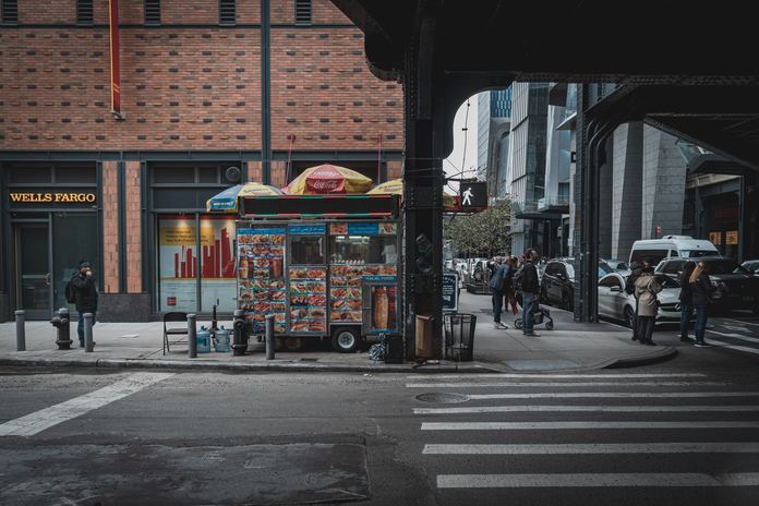 multicolored food cart on road during daytime